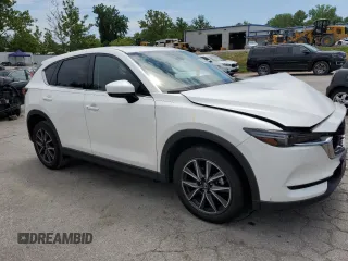 2018 Mazda CX-5 Grand Touring with VIN JM3KFBDM7J0302037, listed as a Copart auction lot 63021845 with Not provided miles and Salvage title. Bid and sale history available at DreamBid. Image 4.