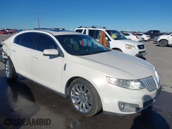 2009 Lincoln MKS z VIN 1LNHM93RX9G618156, wystawiony jako IAAI lot #41054366 z przebiegiem 127 060 mil mil oraz . Historia ofert i sprzedaży dostępna na DreamBid. Obrazek 1.