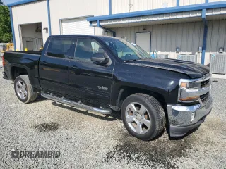 2016 Chevrolet Silverado 1500 LT with VIN 3GCPCRECXGG280013, listed as a Copart auction lot 54097785 with 60,691 mi miles and Salvage Title. Bid and sale history available at DreamBid. Image 4.