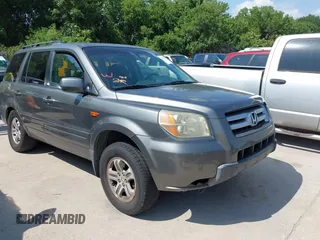 2007 Honda Pilot EX-L z VIN 2HKYF18507H521594, wystawiony jako IAAI lot #42412937 z przebiegiem 172 973 mil mil oraz . Historia ofert i sprzedaży dostępna na DreamBid. Obrazek 1.