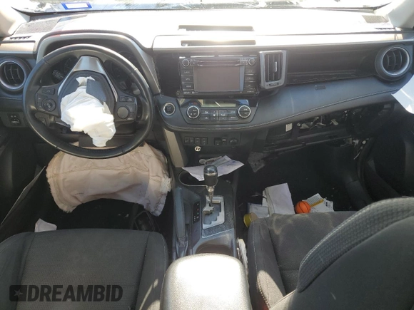 2018 Toyota RAV4 XLE with VIN 2T3RFREV2JW804022, listed as a Copart auction lot 87150944 with Not Provided miles and Salvage Title. Bid and sale history available at DreamBid. Image 8.