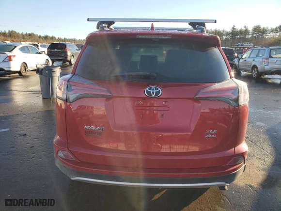 2016 Toyota RAV4 XLE with VIN JTMRFREV0GJ086087, listed as a Copart auction lot 83670964 with 83,045 mi miles and Salvage Title. Bid and sale history available at carsss.com. Image 6.