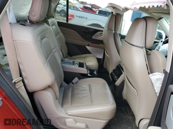 2020 Lincoln Aviator Reserve z VIN 5LM5J7XC5LGL26697, wystawiony jako Copart lot #57570355 z przebiegiem 64 692 mil mil oraz Czysty tytuł • Clean title. Historia ofert i sprzedaży dostępna na DreamBid. Obrazek 10.