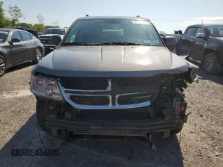 2013 Dodge Journey SXT with VIN 3C4PDCBGXDT630423, listed as a Copart auction lot 62359685 with 151,653 mi miles and Salvage title. Bid and sale history available at DreamBid. Image 5.