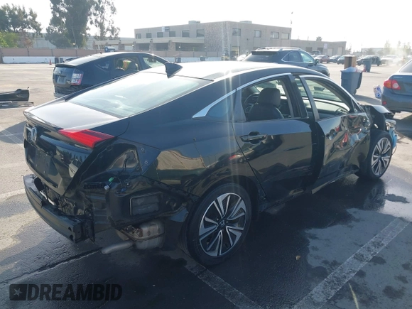 2016 Honda Civic Sedan EX-L with VIN 19XFC1F73GE215112, listed as a IAAI auction lot 42093218 with 67,233 mi miles. Bid and sale history available at carsss.com. Image 4.