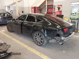 2015 Audi A7 3.0 Premium Plus with VIN WAUWGAFC2FN011927, listed as a IAAI auction lot 41846990 with 98,051 mi miles. Bid and sale history available at carsss.com. Image 3.