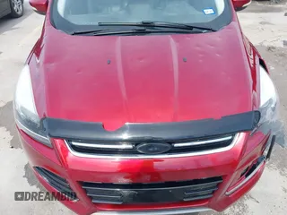2013 Ford Escape Titanium with VIN 1FMCU0J98DUC93235, listed as a IAAI auction lot 42253289 with 107,030 mi miles and . Bid and sale history available at DreamBid. Image 17.