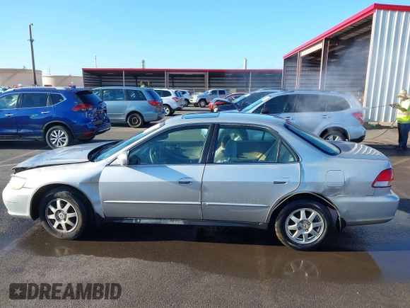 2002 Honda Accord SE with VIN 1HGCG56712A064900, listed as a IAAI auction lot 42184540 with Not provided miles and . Bid and sale history available at DreamBid. Image 14.