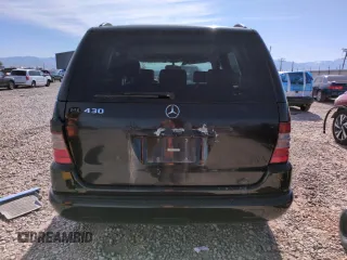 1999 Mercedes-Benz M 320/430/500 z VIN 4JGAB72E7XA094491, wystawiony jako Copart lot #57490025 z przebiegiem 194 406 mil mil oraz Szkoda całkowita • Salvage title. Historia ofert i sprzedaży dostępna na DreamBid. Obrazek 6.