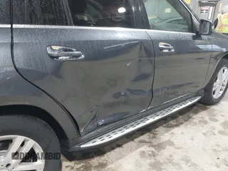 2013 Mercedes-Benz GL-Class GL 450 with VIN 4JGDF7CE1DA215608, listed as a IAAI auction lot 41924332 with 137,052 mi miles. Bid and sale history available at carsss.com. Image 6.