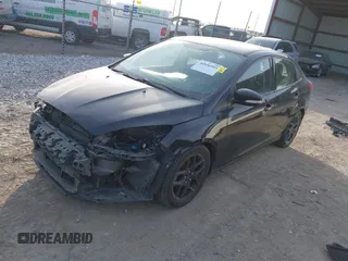 2016 Ford Focus SE z VIN 1FADP3FEXGL310270, wystawiony jako IAAI lot #40956503 z przebiegiem 156 812 mil mil oraz . Historia ofert i sprzedaży dostępna na DreamBid. Obrazek 18.
