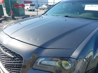 2016 Chrysler 300 with VIN 2C3CCABG6GH321121, listed as a IAAI auction lot 41951797 with 115,170 mi miles. Bid and sale history available at carsss.com. Image 6.