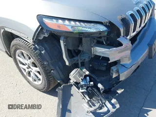 2015 Jeep Cherokee Latitude z VIN 1C4PJMCB0FW749323, wystawiony jako IAAI lot #41852102 z przebiegiem 162 060 mil mil oraz . Historia ofert i sprzedaży dostępna na DreamBid. Obrazek 6.