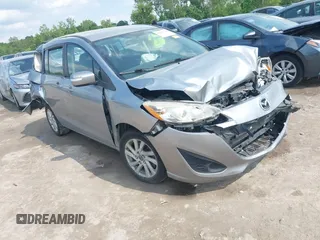 2014 Mazda 5 Sport with VIN JM1CW2BL6E0164195, listed as a IAAI auction lot 42455158 with 155,007 mi miles and . Bid and sale history available at DreamBid. Image 1.