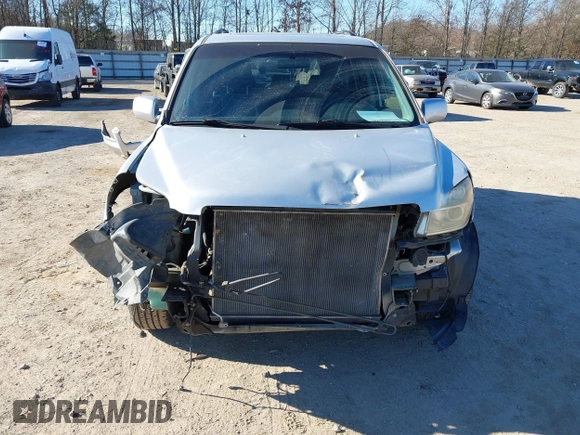 2006 Honda Pilot EX-L with VIN 5FNYF18786B030253, listed as a IAAI auction lot 41708620 with 146,713 mi miles and . Bid and sale history available at DreamBid. Image 6.