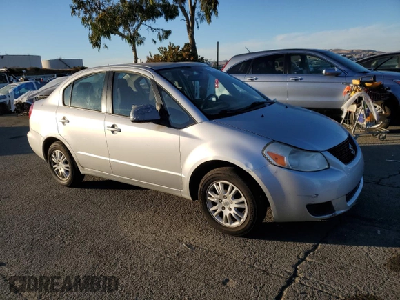 2012 Suzuki SX4 LE with VIN JS2YC5A33C6301529, listed as a Copart auction lot 79363394 with 72,348 mi miles and Clean Title. Bid and sale history available at carsss.com. Image 4.