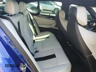 2018 BMW M5 z VIN WBSJF0C51JB282030, wystawiony jako Copart lot #54773835 z przebiegiem 44 046 mil mil oraz Szkody całkowita. Historia ofert i sprzedaży dostępna na DreamBid. Obrazek 10.