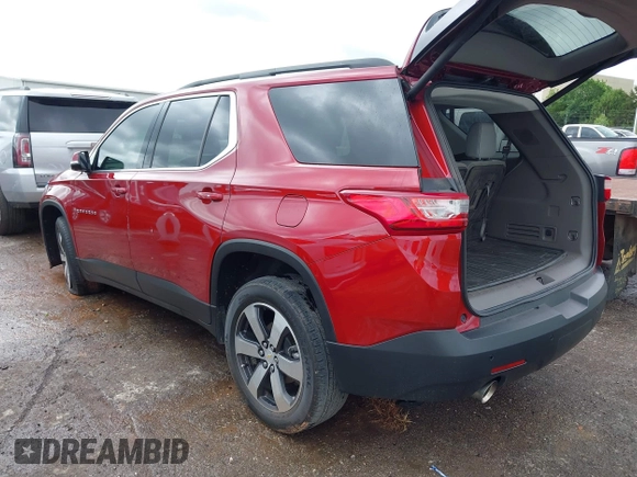 2020 Chevrolet Traverse LT with VIN 1GNERHKW7LJ273289, listed as a IAAI auction lot 42356645 with 66,156 mi miles and . Bid and sale history available at DreamBid. Image 3.