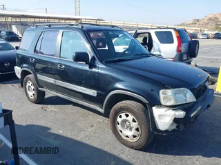 1999 Honda CR-V LX with VIN JHLRD284XXC018161, listed as a IAAI auction lot 41421514 with 209,066 mi miles. Bid and sale history available at carsss.com. Image 1.