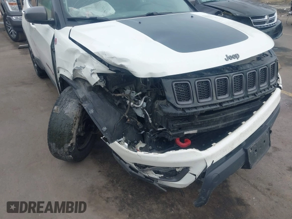 2018 Jeep Compass Trailhawk with VIN 3C4NJDDB9JT174899, listed as a IAAI auction lot 41635784 with 124,656 mi miles and . Bid and sale history available at DreamBid. Image 6.