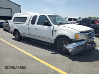 2003 Ford F-150 XL with VIN 2FTRX17L23CA17128, listed as a Copart auction lot 60144965 with 121,055 mi miles and Salvage title. Bid and sale history available at DreamBid. Image 4.
