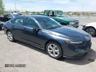 2023 Honda Accord Sedan LX with VIN 1HGCY1F28PA004601, listed as a IAAI auction lot 42031327 with 48,996 mi miles. Bid and sale history available at carsss.com. Image 13.