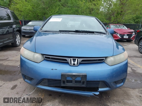 2006 Honda Civic Cpe EX with VIN 2HGFG12826H560333, listed as a IAAI auction lot 42131156 with 182,438 mi miles. Bid and sale history available at carsss.com. Image 6.