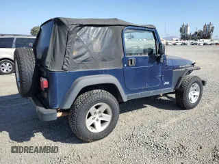 2005 Jeep Wrangler Rubicon with VIN 1J4FA69S05P351725, listed as a Copart auction lot 71411904 with 144,557 mi miles and Salvage Title. Bid and sale history available at carsss.com. Image 3.