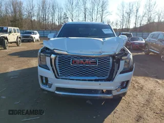 2021 GMC Yukon Denali with VIN 1GKS2DKL2MR458128, listed as a IAAI auction lot 41343876 with 64,732 mi miles. Bid and sale history available at carsss.com. Image 12.