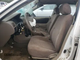 2000 Chevrolet Prizm z VIN 1Y1SK5281YZ415530, wystawiony jako Copart lot #60704824 z przebiegiem Nie podano mil oraz Szkody całkowita. Historia ofert i sprzedaży dostępna na DreamBid. Obrazek 7.