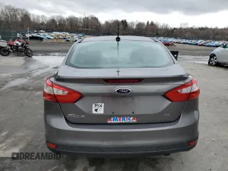 2014 Ford Focus SE with VIN 1FADP3F27EL179253, listed as a Copart auction lot 52913225 with 106,292 mi miles and Salvage Title. Bid and sale history available at DreamBid. Image 6.