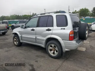1999 Suzuki Grand Vitara JLX z VIN JS3TD62V9X4123460, wystawiony jako Copart lot #58574925 z przebiegiem 260 368 mil mil oraz Szkoda całkowita • Salvage title. Historia ofert i sprzedaży dostępna na DreamBid. Obrazek 2.