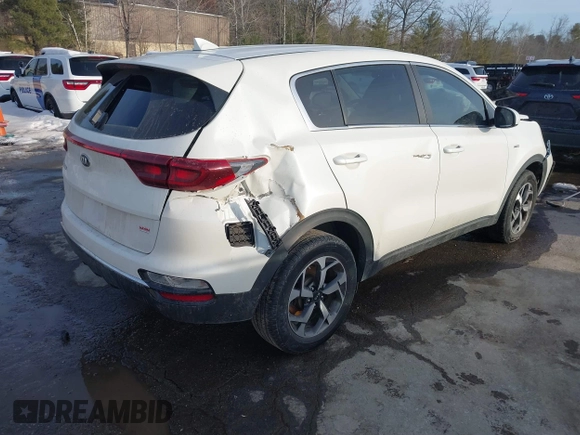 2021 Kia Sportage LX with VIN KNDPMCACXM7901175, listed as a IAAI auction lot 41588890 with 94,404 mi miles and . Bid and sale history available at carsss.com. Image 4.
