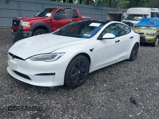 2021 Tesla Model S Plaid z VIN 5YJSA1E62MF452838, wystawiony jako IAAI lot #42726183 z przebiegiem 21 725 mil mil oraz . Historia ofert i sprzedaży dostępna na DreamBid. Obrazek 2.