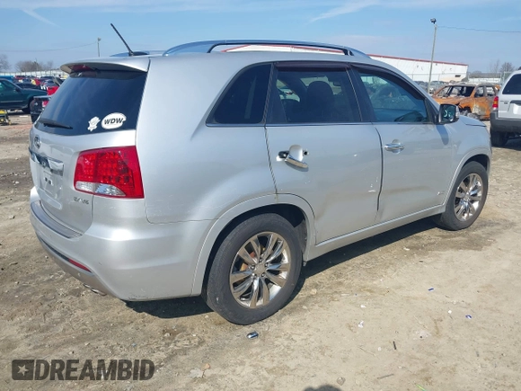 2012 Kia Sorento SX with VIN 5XYKWDA23CG194617, listed as a IAAI auction lot 41504630 with 161,157 mi miles. Bid and sale history available at carsss.com. Image 4.