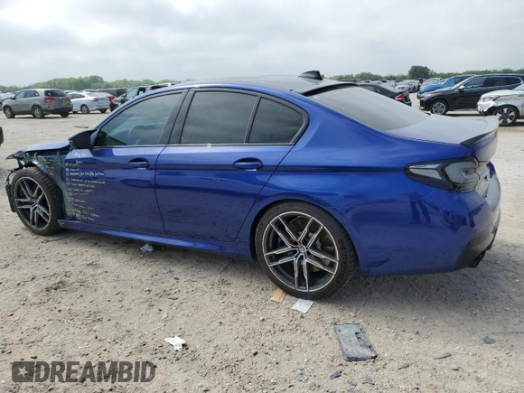 2023 BMW M5 with VIN WBS83CH06PCM62287, listed as a Copart auction lot 54581894 with 0 mi miles and Salvage Title. Bid and sale history available at carsss.com. Image 2.