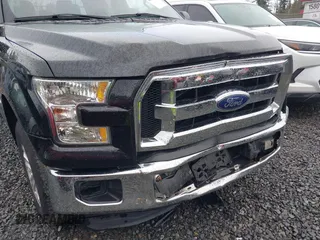 2015 Ford F-150 XL with VIN 1FTEW1CG6FFA58977, listed as a IAAI auction lot 41986637 with 137,823 mi miles. Bid and sale history available at carsss.com. Image 6.