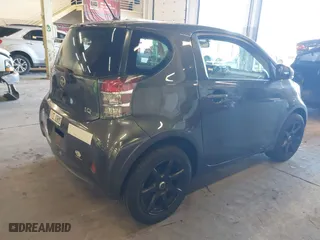 2012 Scion iQ with VIN JTNJJXB02CJ009171, listed as a IAAI auction lot 41425041 with 117,714 mi miles. Bid and sale history available at carsss.com. Image 4.