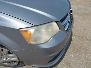 2014 Dodge Grand Caravan SXT z VIN 2C4RDGCG3ER128971, wystawiony jako IAAI lot #41921386 z przebiegiem 255 074 mil mil oraz . Historia ofert i sprzedaży dostępna na DreamBid. Obrazek 13.