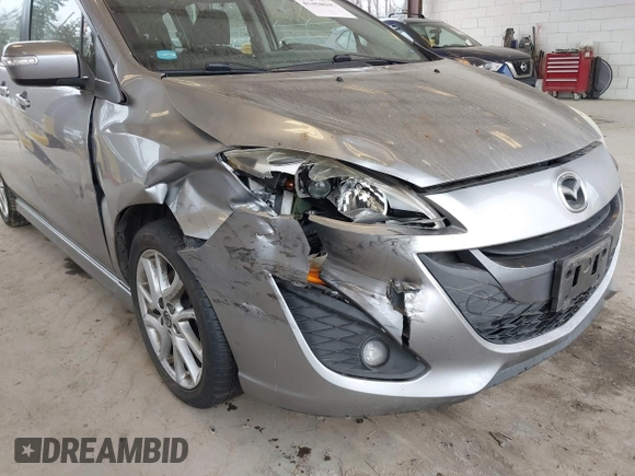 2014 Mazda 5 Touring with VIN JM1CW2CL6E0164146, listed as a IAAI auction lot 41458945 with 157,345 mi miles. Bid and sale history available at carsss.com. Image 6.