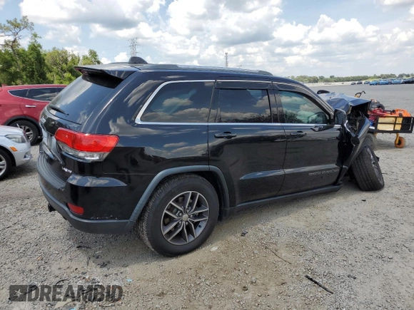 2018 Jeep Grand Cherokee Laredo E with VIN 1C4RJEAG1JC354221, listed as a Copart auction lot 58002715 with 108,223 mi miles and Salvage title. Bid and sale history available at DreamBid. Image 3.