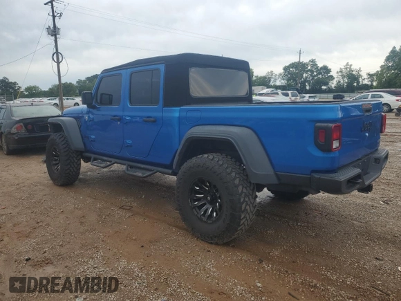 2020 Jeep Gladiator Sport S с VIN 1C6JJTAGXLL171914, выставлен на аукционе Copart как лот 55228435 с пробегом 81 848 миль миль и Списание • Salvage title. История ставок и продаж доступна на DreamBid. Изображение 2.
