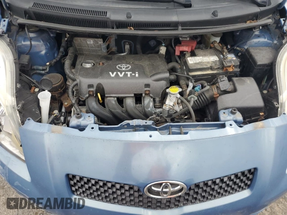 2007 Toyota Yaris with VIN JTDJT923475083016, listed as a Copart auction lot 52903115 with 127,280 mi miles and Salvage Title. Bid and sale history available at carsss.com. Image 13.