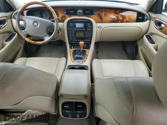 2006 Jaguar XJ with VIN SAJWA71B06SH01185, listed as a Copart auction lot 79199994 with 120,530 mi miles and Clean Title. Bid and sale history available at carsss.com. Image 8.