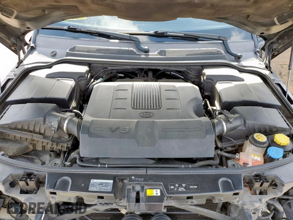2013 Land Rover Range Rover Sport HSE Lux z VIN SALSK2D47DA800573, wystawiony jako Copart lot #57288585 z przebiegiem 115 126 mil mil oraz Szkoda całkowita • Salvage title. Historia ofert i sprzedaży dostępna na DreamBid. Obrazek 11.