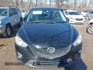2014 Mazda CX-5 Sport with VIN JM3KE2BE7E0313978, listed as a IAAI auction lot 41437144 with 161,181 mi miles and . Bid and sale history available at carsss.com. Image 6.