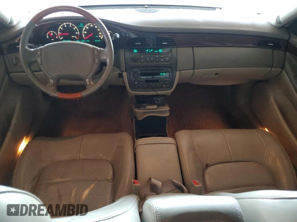 2001 Cadillac DeVille DHS z VIN 1G6KE57Y41U150631, wystawiony jako Copart lot #61805295 z przebiegiem 96 158 mil mil oraz Czysty tytuł • Clean title. Historia ofert i sprzedaży dostępna na DreamBid. Obrazek 8.