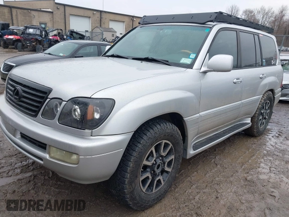 2006 Lexus LX 470 z VIN JTJHT00W364011426, wystawiony jako IAAI lot #42026869 z przebiegiem 254 659 mil mil oraz . Historia ofert i sprzedaży dostępna na DreamBid. Obrazek 17.