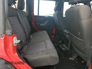 2012 Jeep Wrangler Unlimited Sport z VIN 1C4BJWDG0CL272440, wystawiony jako Copart lot #56044005 z przebiegiem 143 117 mil mil oraz Szkoda całkowita • Salvage title. Historia ofert i sprzedaży dostępna na DreamBid. Obrazek 11.