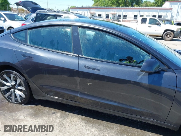2024 Tesla Model 3 z VIN 5YJ3E1EA4RF735729, wystawiony jako IAAI lot #41964387 z przebiegiem Nie podano mil oraz . Historia ofert i sprzedaży dostępna na DreamBid. Obrazek 14.